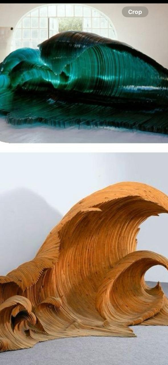 Original reference showing green glass and wooden wave sculptures